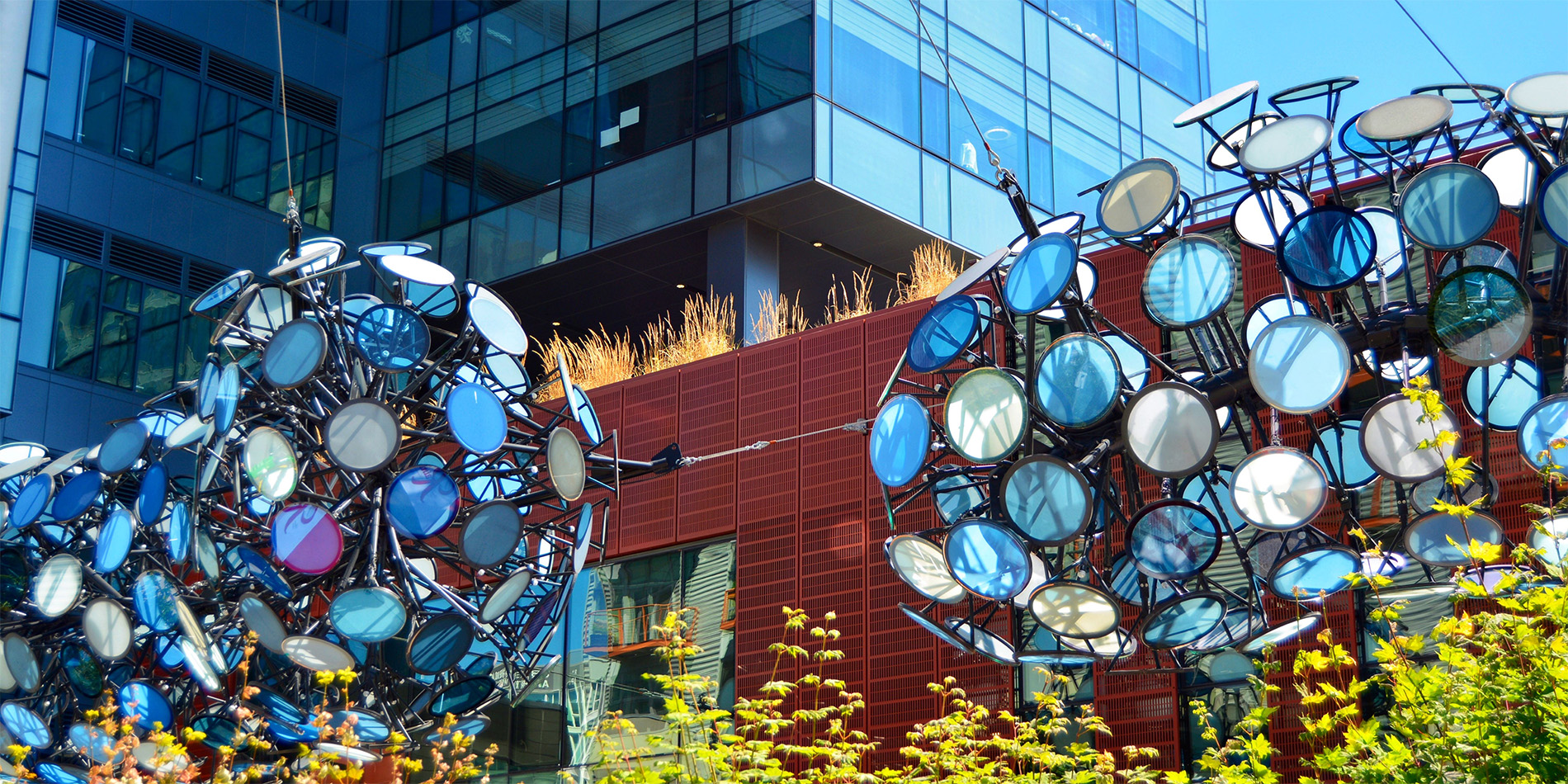 glass artwork in front of building