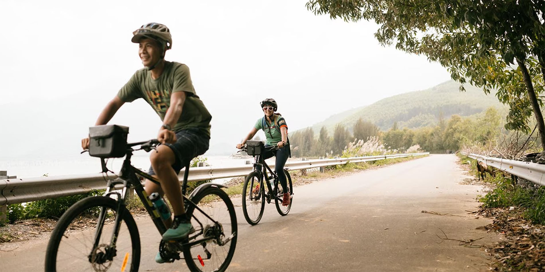 two people riding bikes