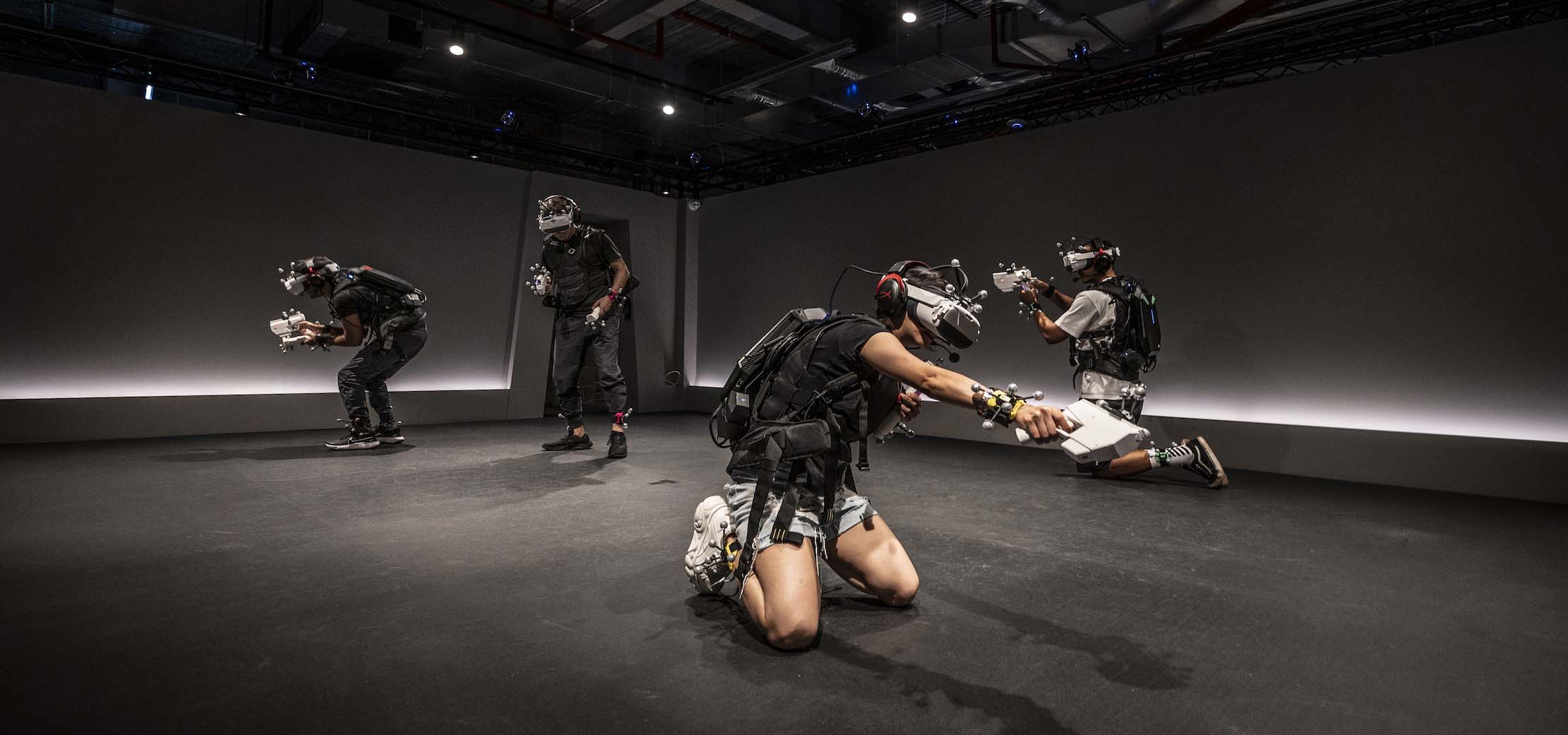 A group of friends in virtual reality gear.
