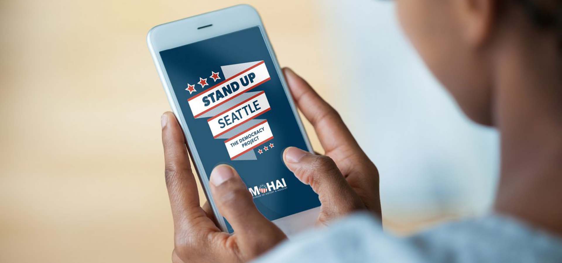 Woman looking on cell phone of election event graphic