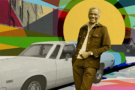 man standing in front of car with colorful background