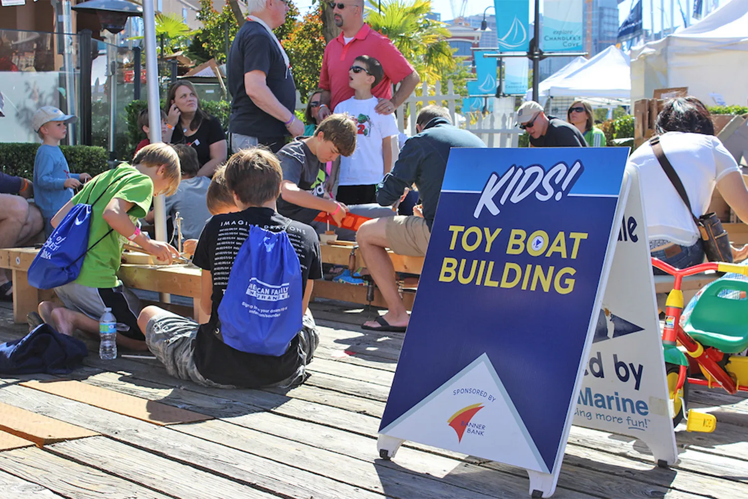 kids at a toy boat building event