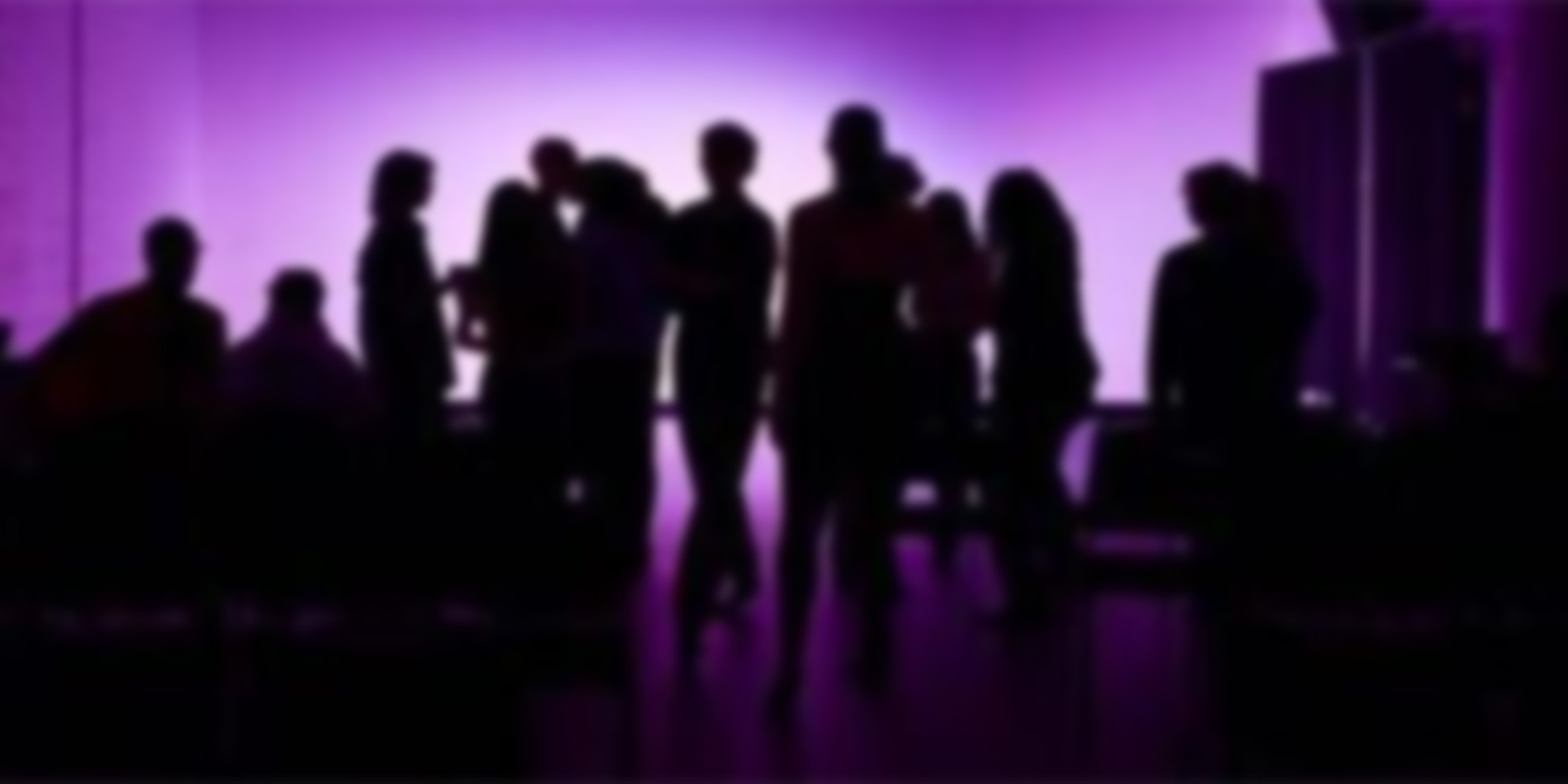 silhouettes of people on purple background