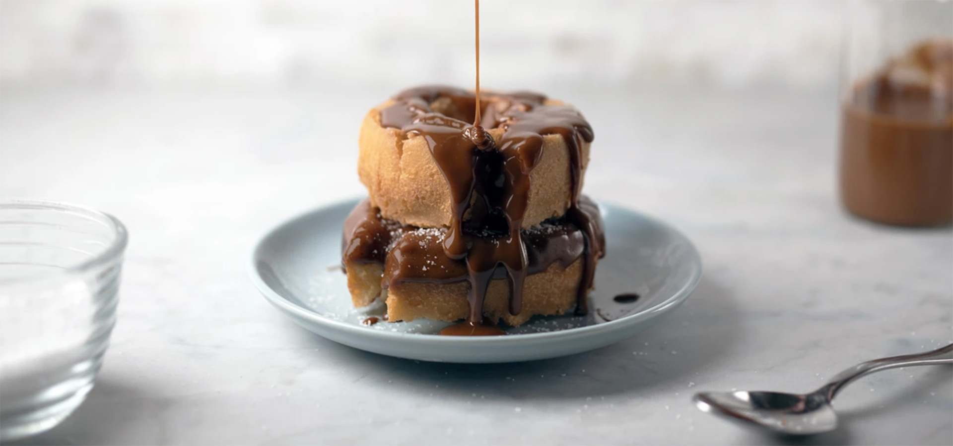 Image of doughnut drizzled with sauce