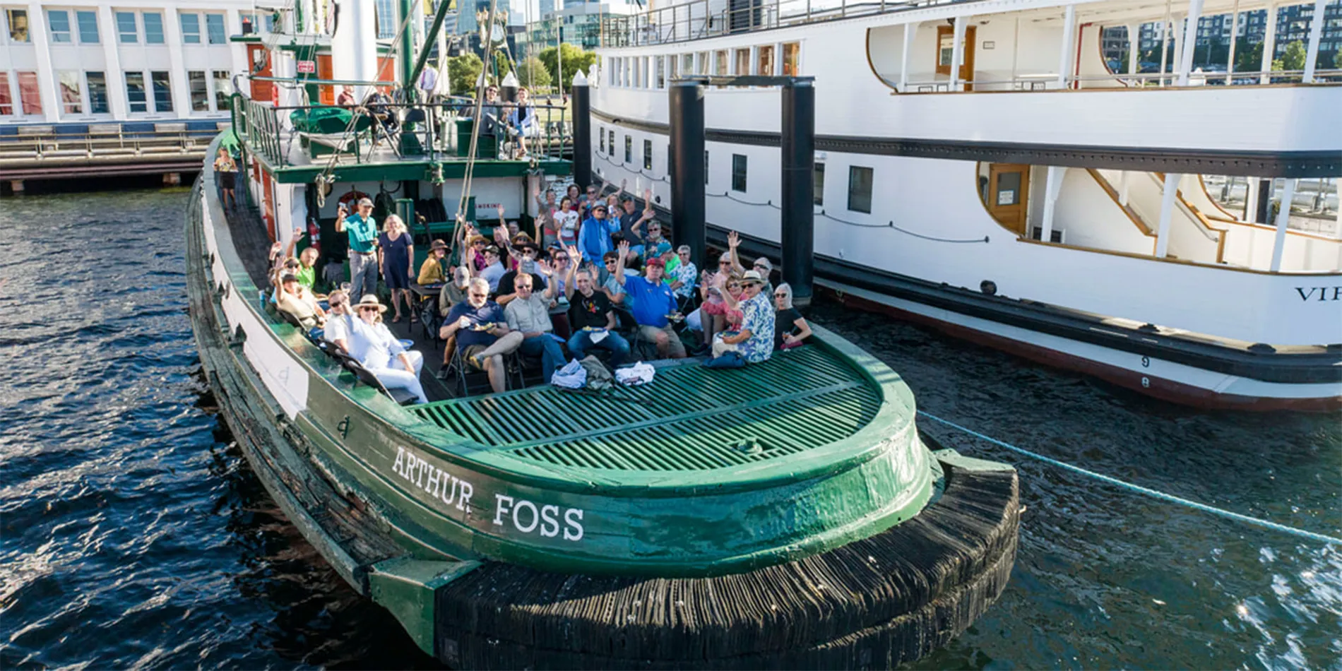 people on a tugboat
