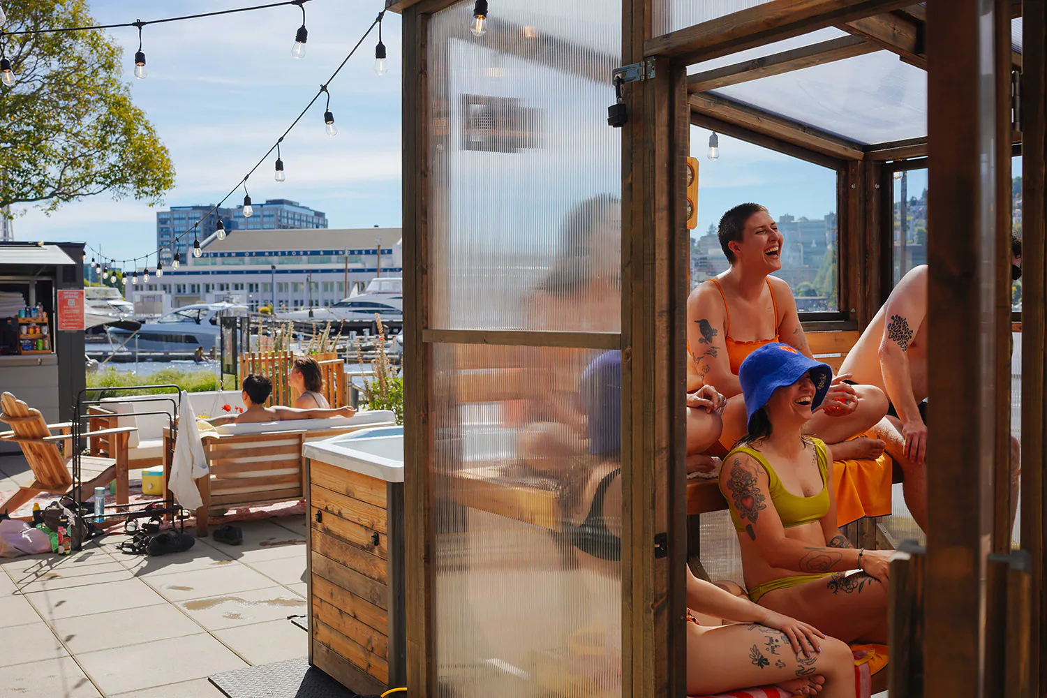 people enjoying outdoor sauna