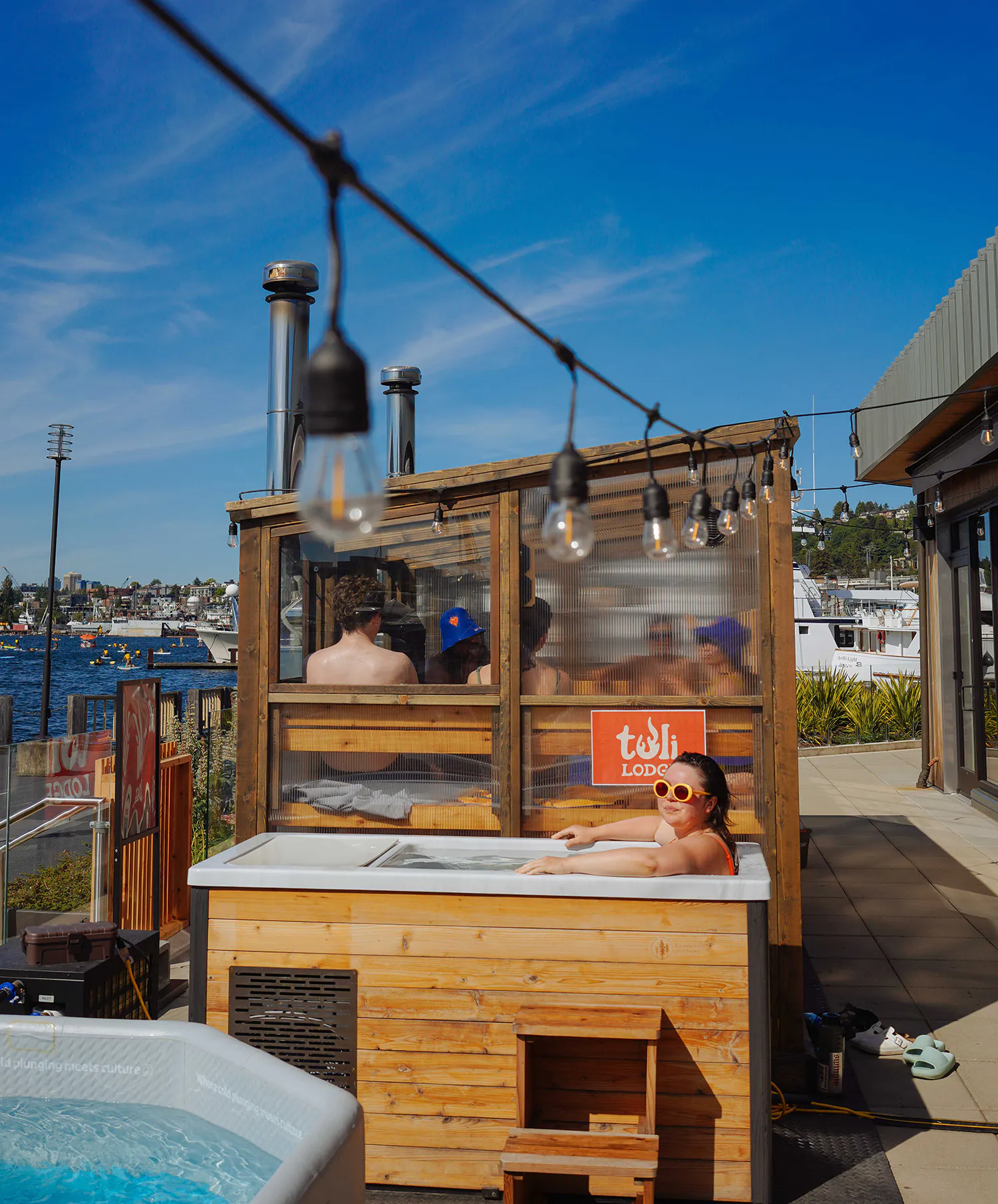 people enjoying outdoor sauna