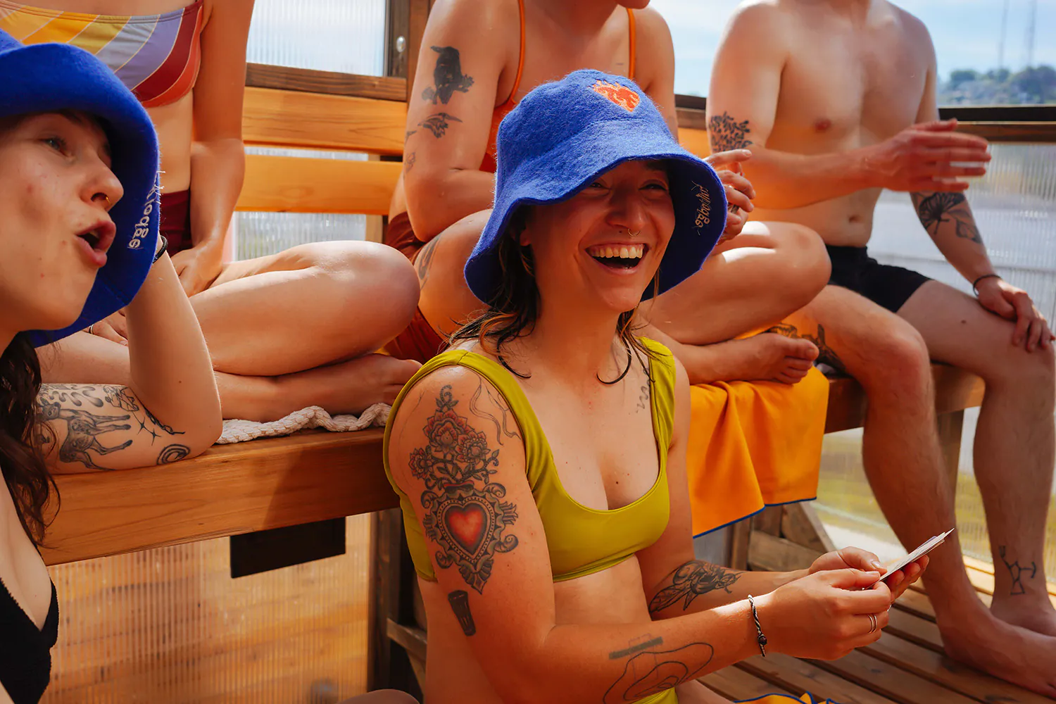 people enjoying outdoor sauna