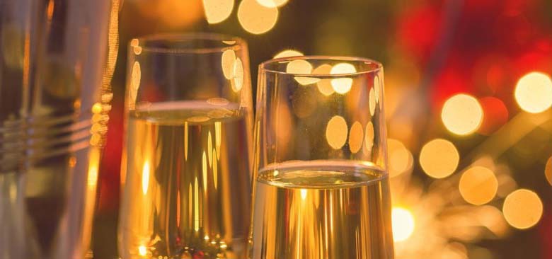 Glasses filled with champagne.