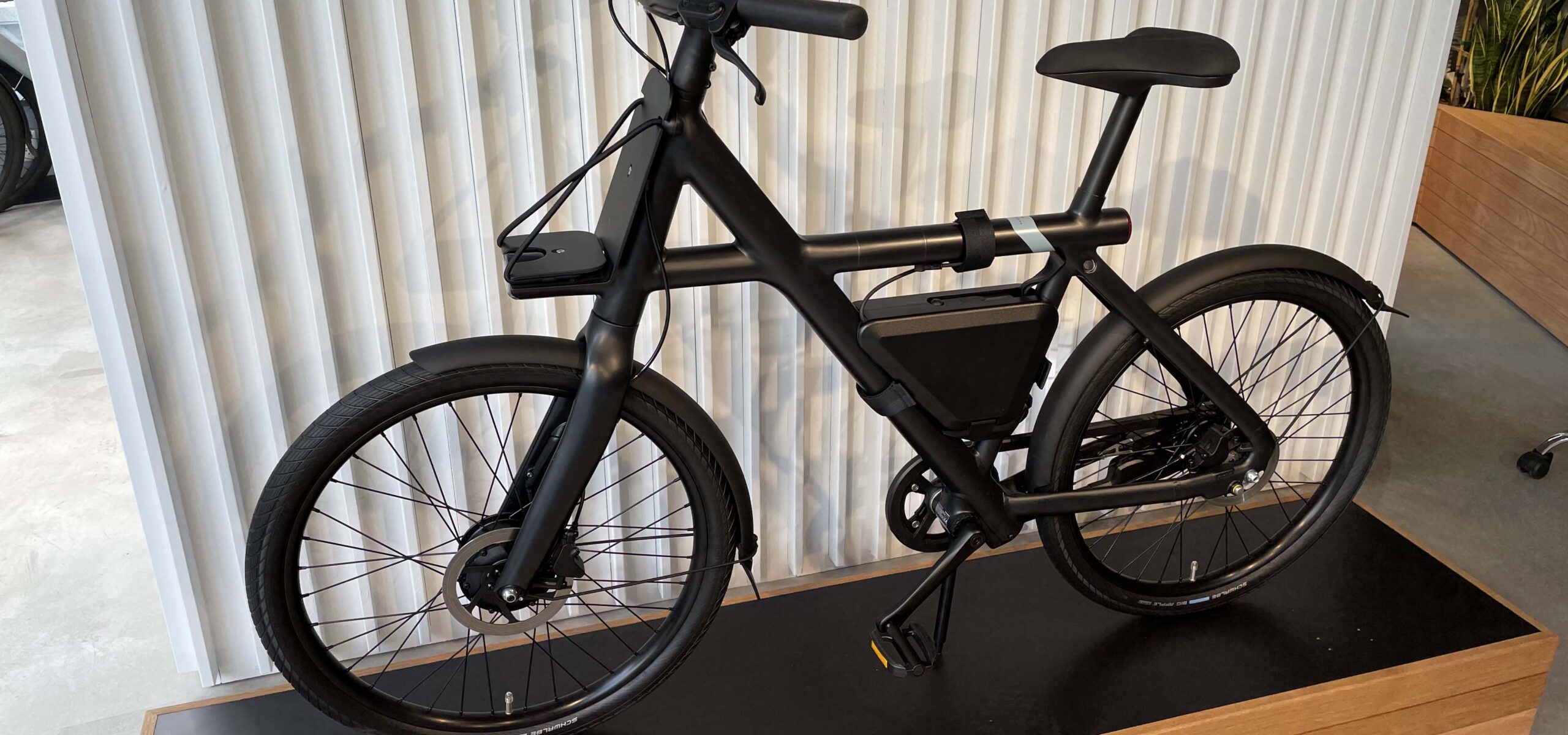 In store display of a black electric bike.