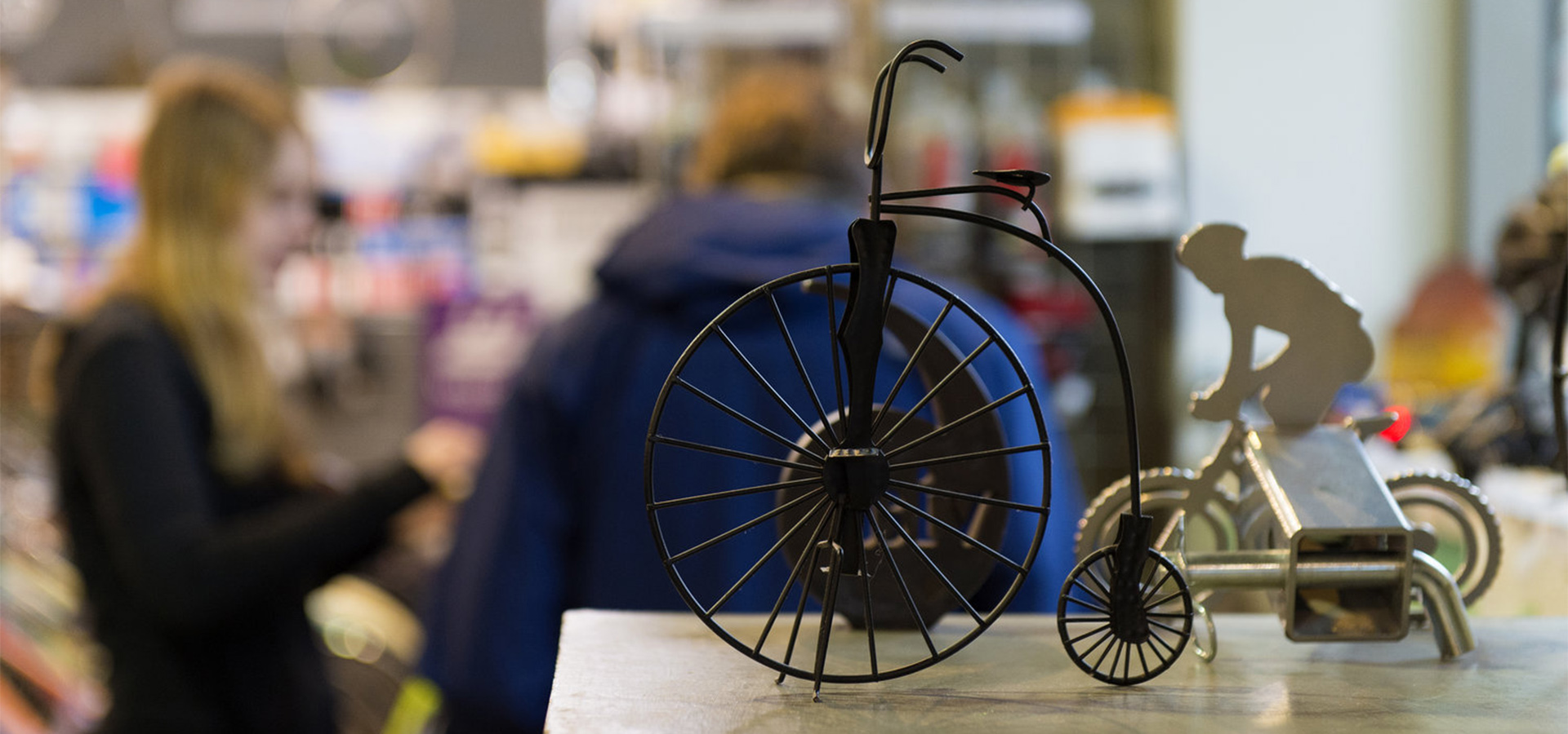 vintage bike and modern bike sculpture