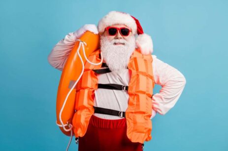Santa in a life vest.