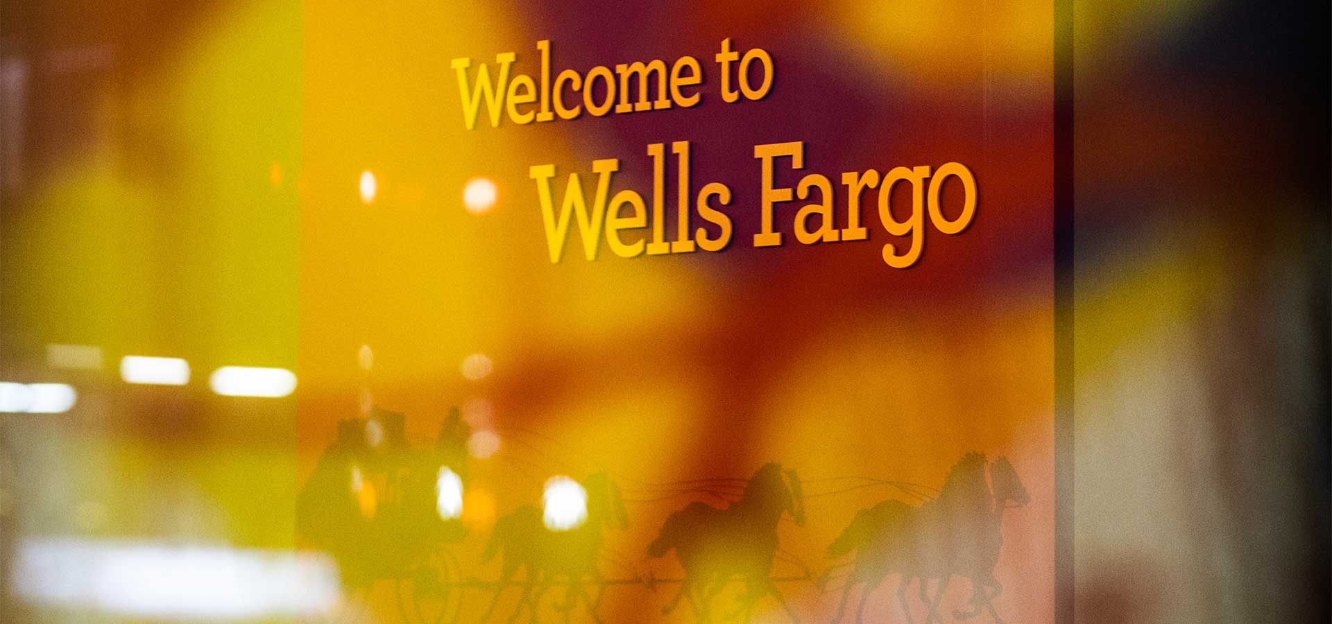 welcome to Wells Fargo tagline in window