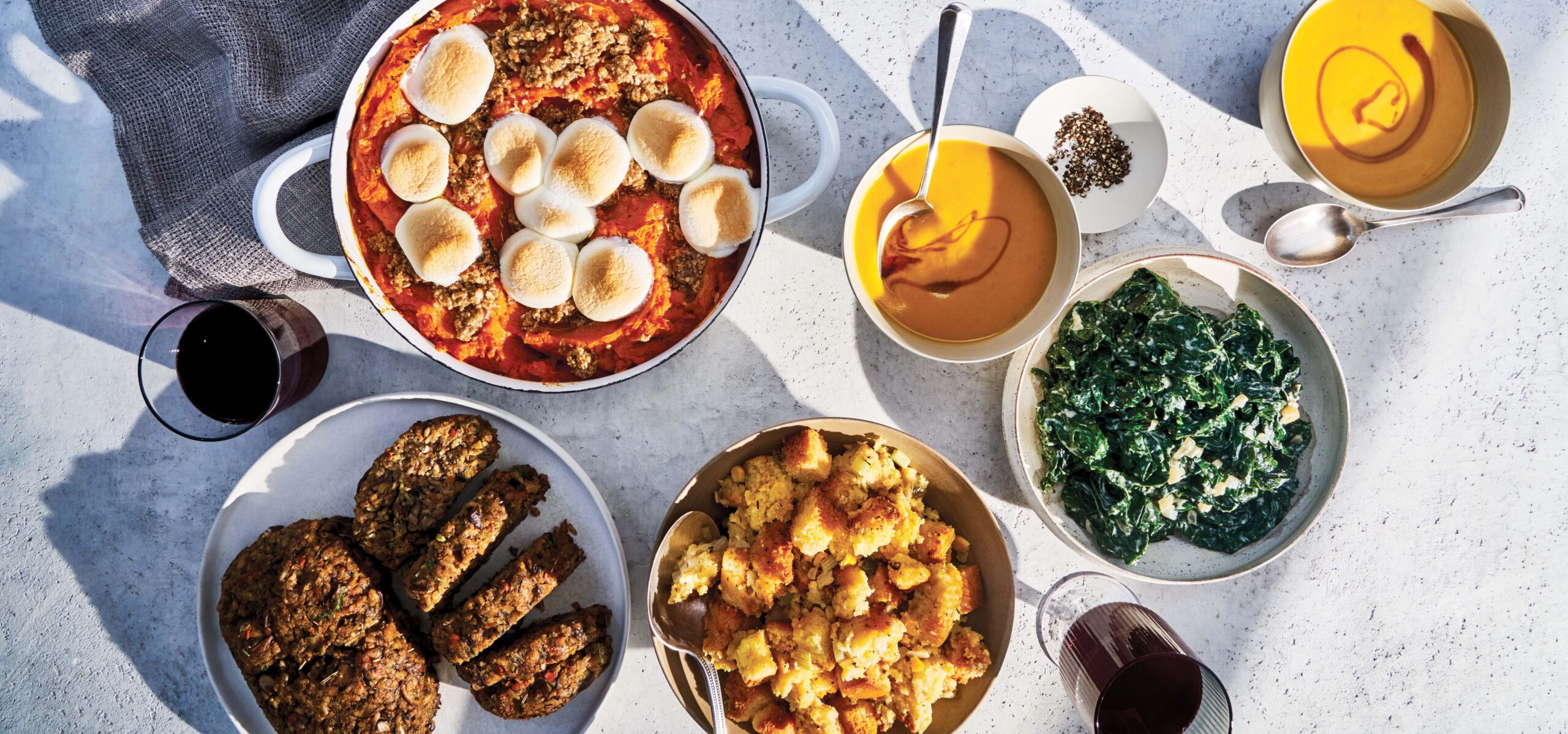Thanksgiving dinner spread of selected vegan dishes.