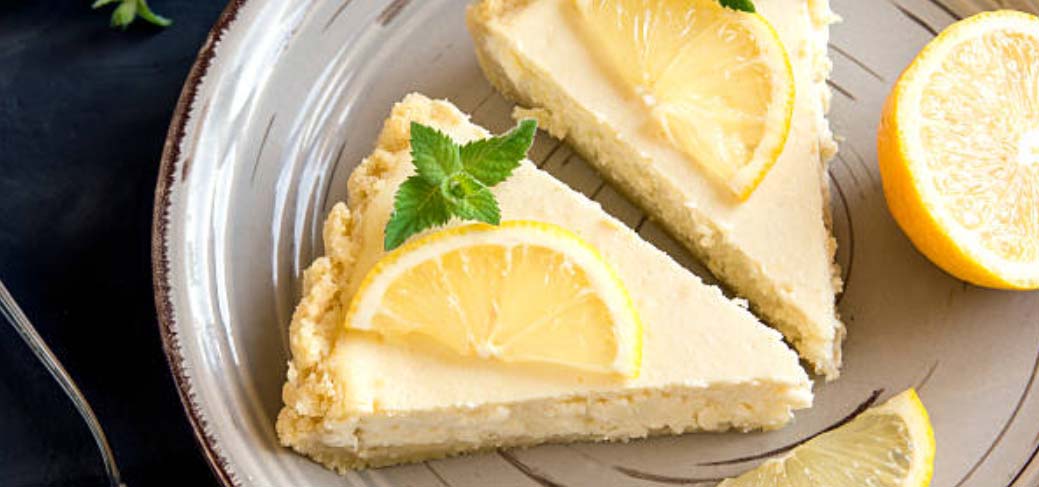 Slices of Meyer Lemon Pie on a white plate.