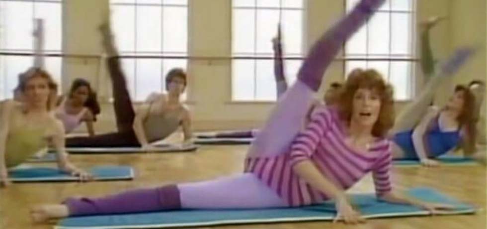 Photograph of 1980's yoga or aerobics class.