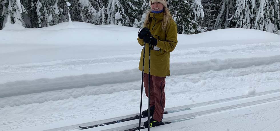 Woman cross country skiing.