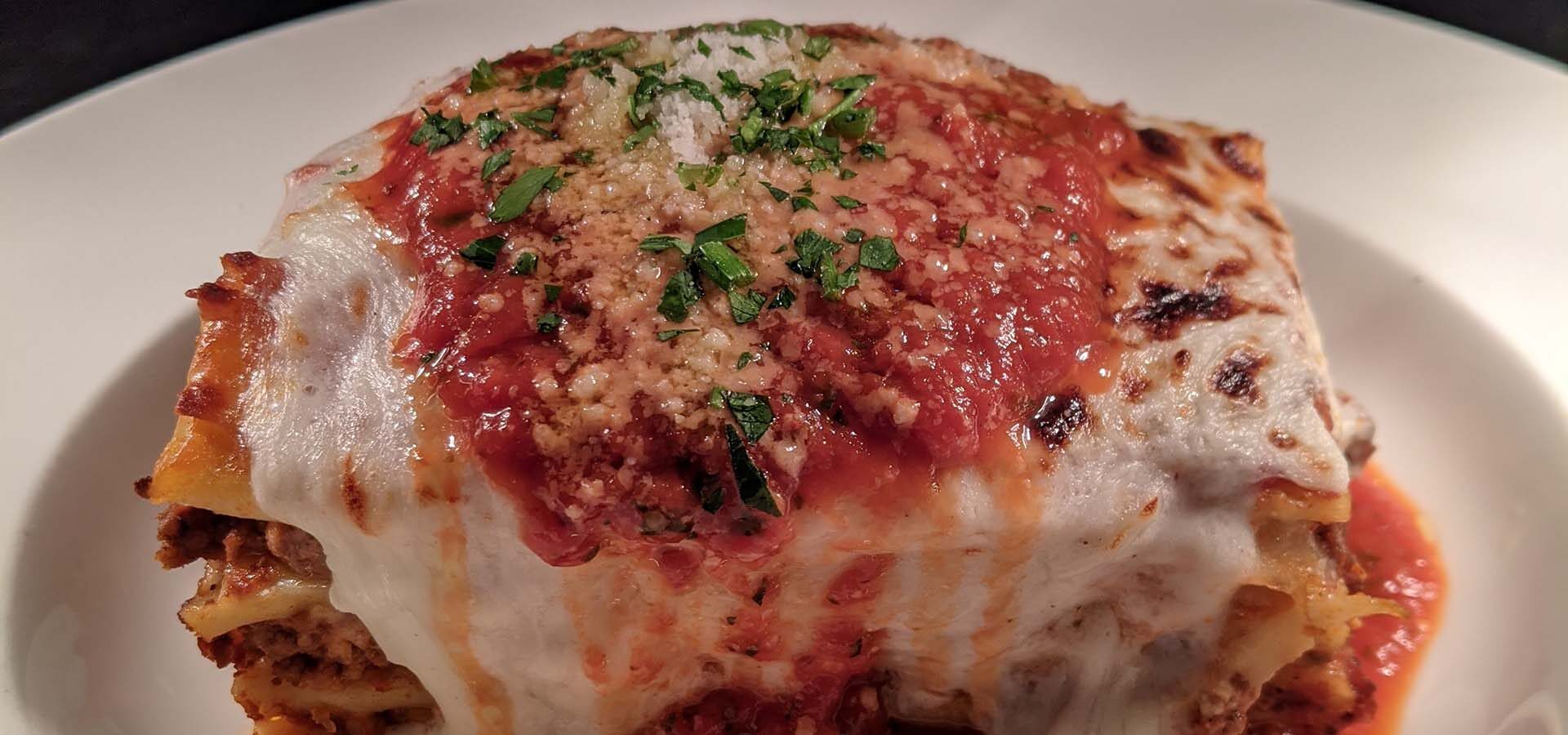 Plate of meat and cheese lasagna.