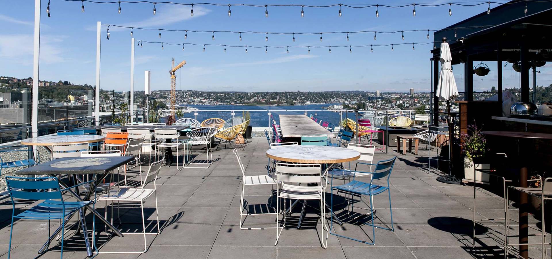 Restaurant outdoor rooftop patio with lake views.