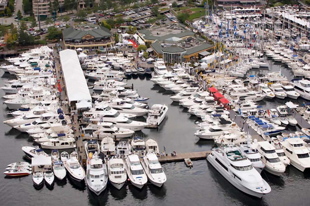 Aerial view of boats moored on piers.